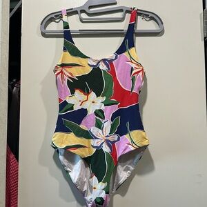 Swimmer one piece with a side of extra back